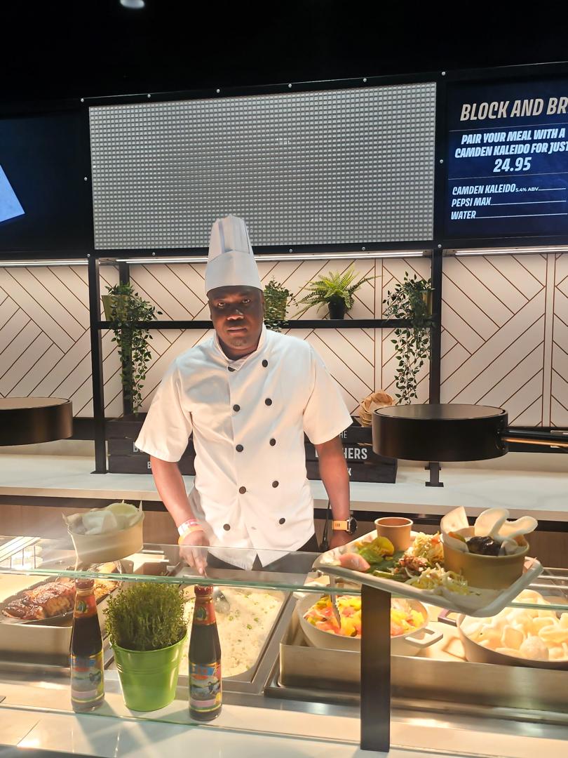 Chef at a live buffet service station
