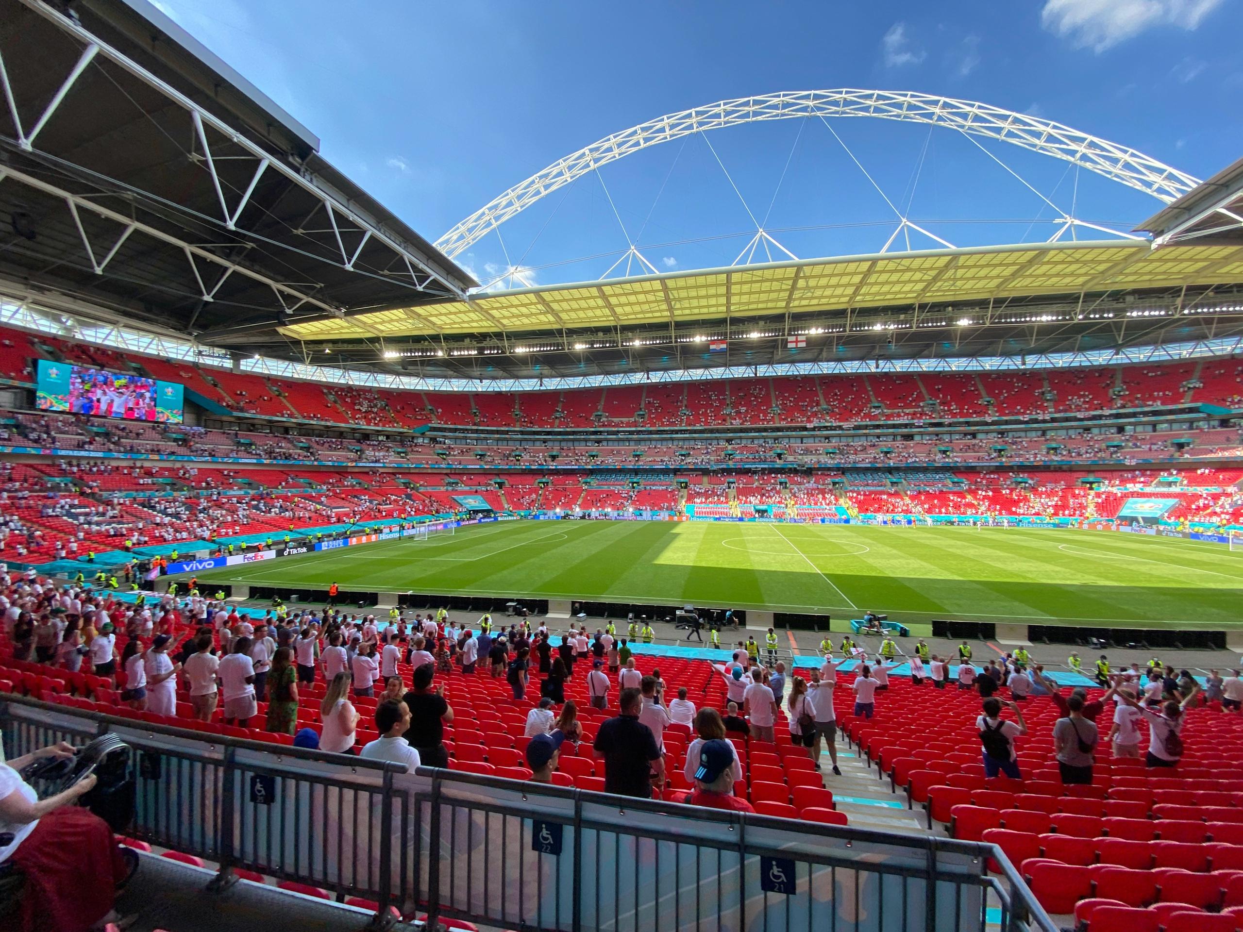 Crowd filling Wembley Stadium for a live sporting event